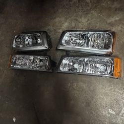 2004 Chevy Silverado 4  piece headlight combo