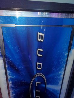 BUD LIGHT GLASS MIROR...AS IN PICTURES PRETTY BIG SIZE..CHECK OUT MY PAGE FOR MORE..PICK UP IN VICTORVILLE..