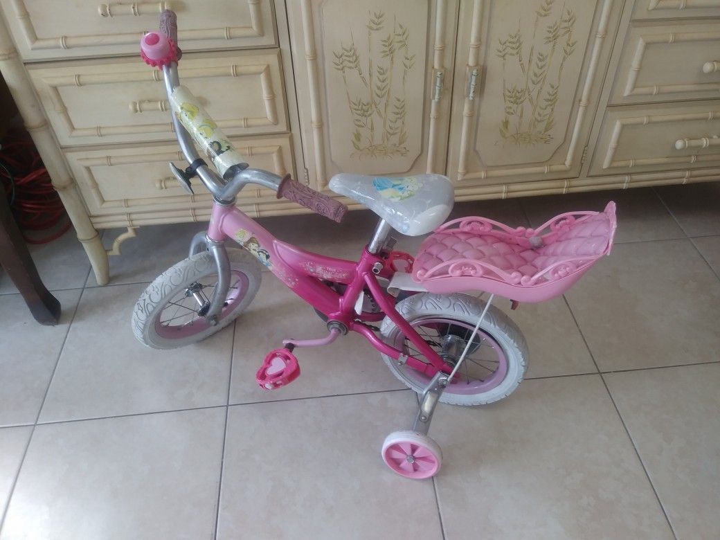 Girls bicycle with training wheels