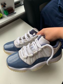 Jordan 11 retro lows, trying to get rid of them. To small. Size 4.5.