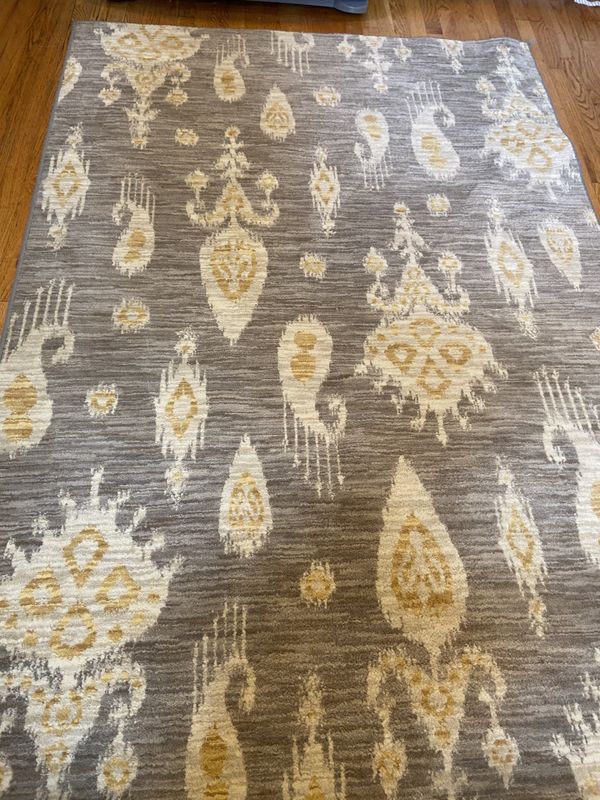 Area Rug. 5x7’9” Shades of grey, cream, and yellow. Originally bought at Macy’s. Excellent