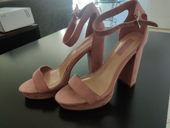Heels Lightly Worn. Size 7
