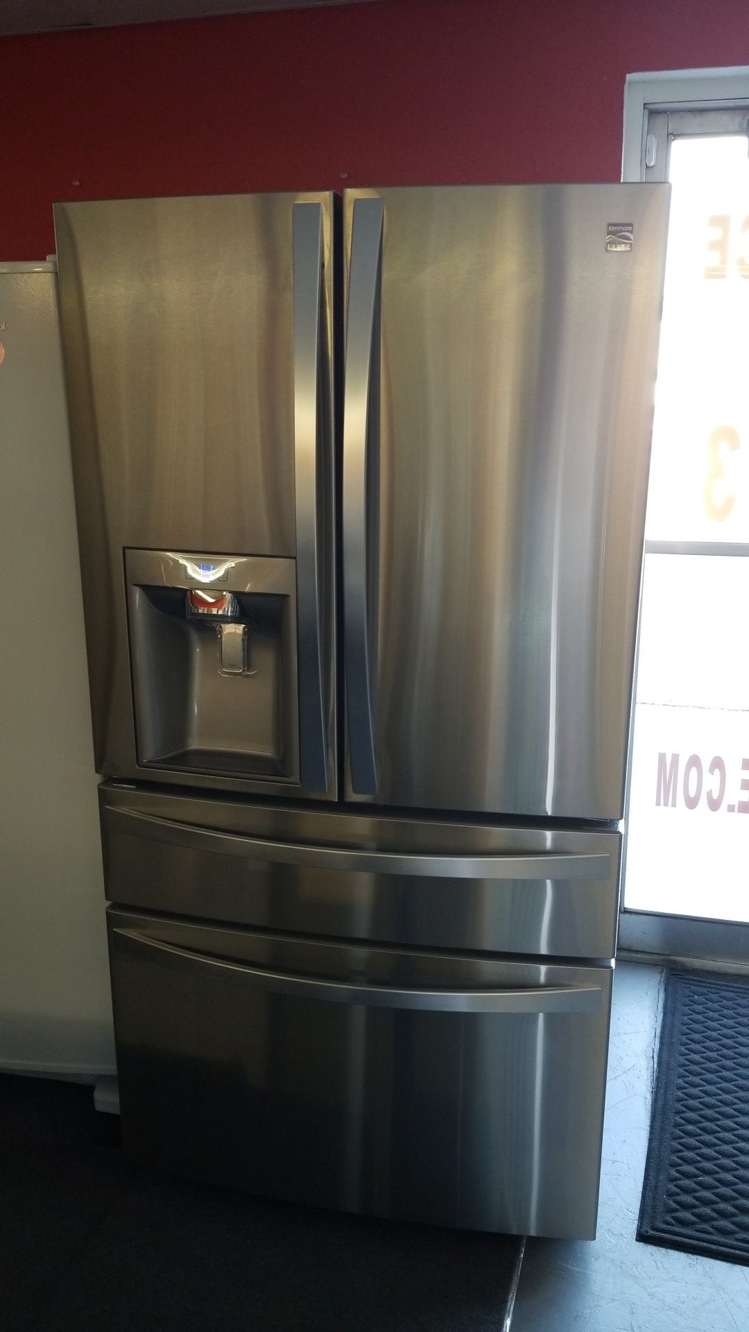 New scratch and dent Kenmore elite 32cu.ft 4 door fridge stainless steel 1 year warranty