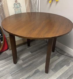 45" round wood table. W/ hardware