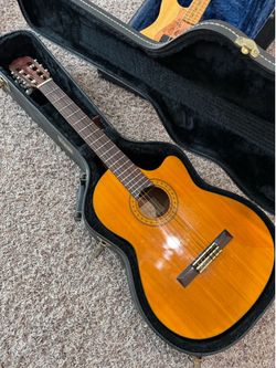 Takamine EG124C acoustic-electric classical nylon-string guitar and case