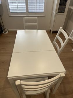 Extensible table and 3 chairs  from IKEA 47” x 28”