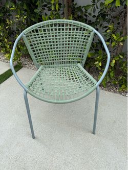 Green “wicker” chairs 4 total