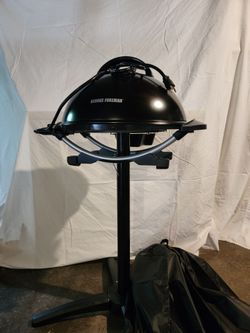 George Foreman Indoor/Outdoor Electric Grill with cover.