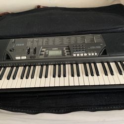 Piano With Piano Bag 