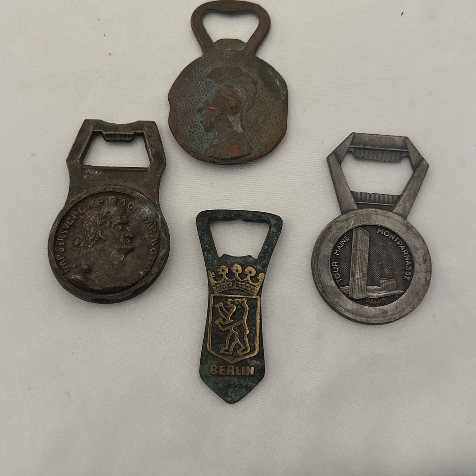 Group Of 4 Antique Bottle Openers