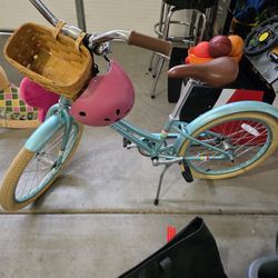PUBLIC kids' cruiser bike with basket + helmet.