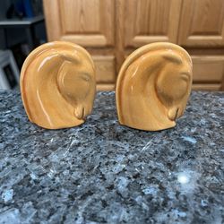 Vintage Rare Mid-Century Horse head pair of salt and pepper shakers.  Size approximately 3 inches tall.  Preowned no stoppers.  Has been on display in