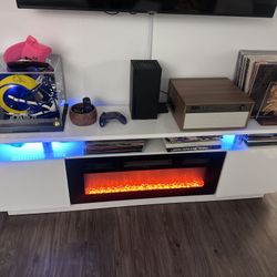 White TV Stand with Electric Fireplace and LED Lighting