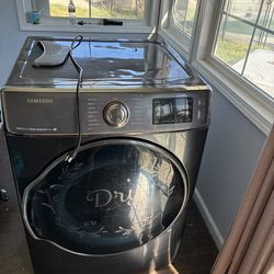 Samsung front-load dryer (black finish, older model)