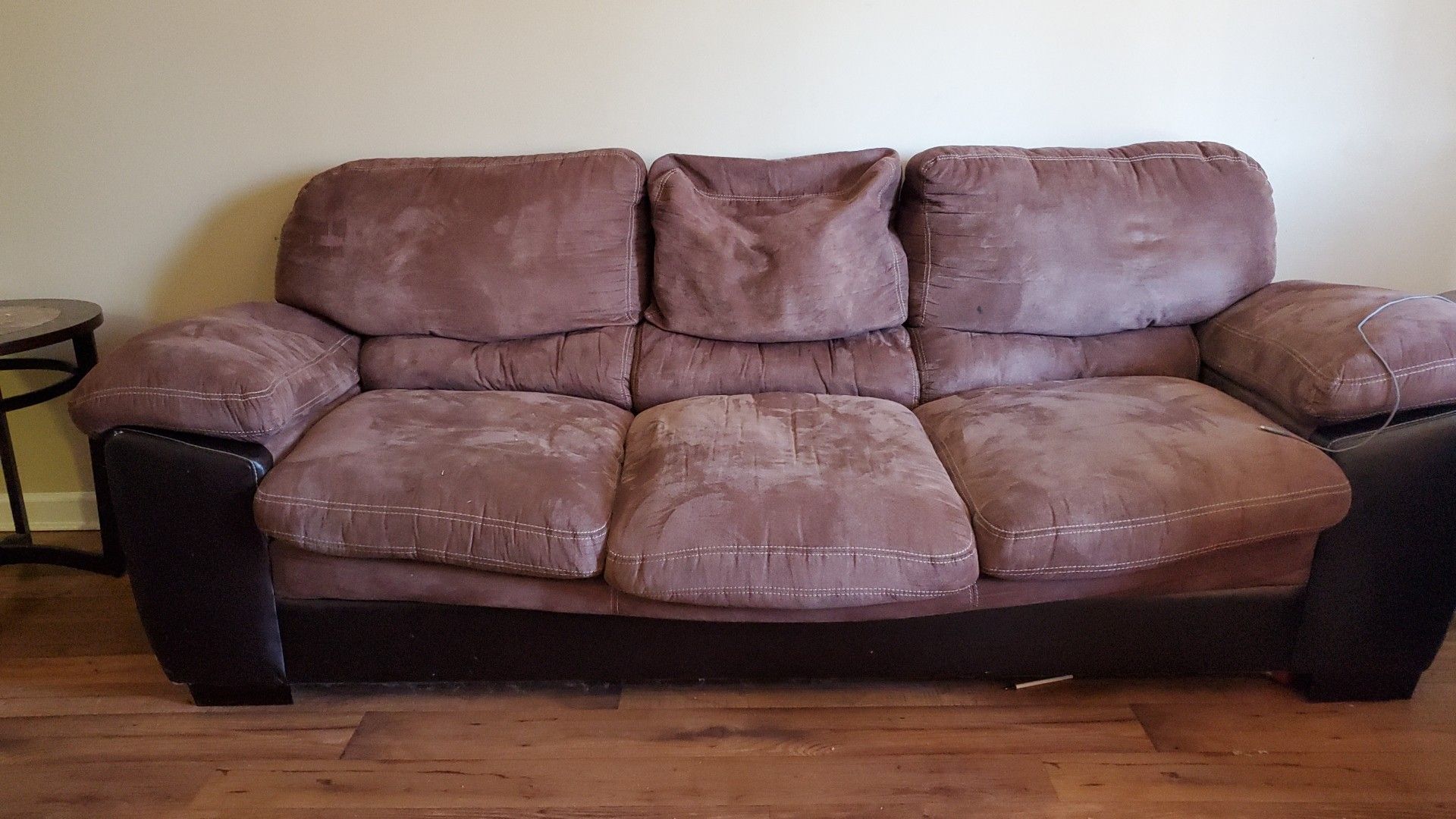 Leather couch with brown suede