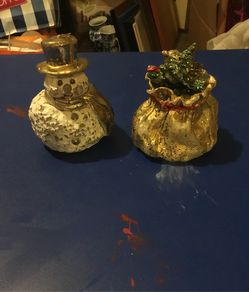 Two Christmas decorative candles