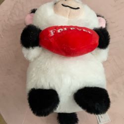 Small Stuffed Animal,  With Black White, And Red