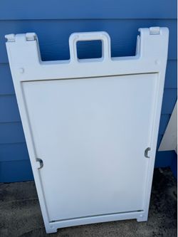 Two portable folding signs