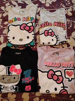 Four Hello Kitty Kids T- Shirts See sizes in description