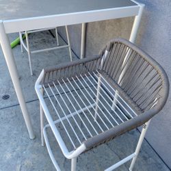 Outdoor patio set includes table and 2 bar stools. Excellent condition. The top measures 34” X 34”. The height is 42”.  Please message with any questi