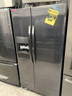 Frigidaire side by side in dark stainless