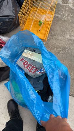 Bags of clothes shoes and pants