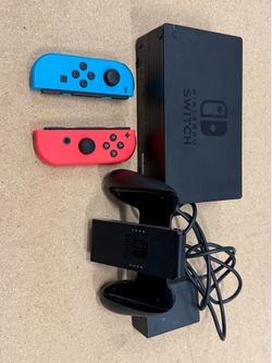 Nintendo Switch Joy-Cons w/ grip and dock