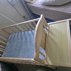 baby crib with wooden door