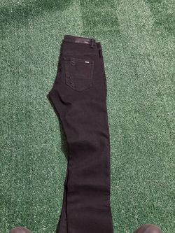Ripped black Amiri jeans