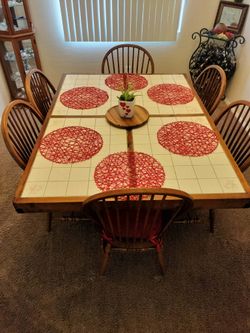 Tile topped table with 6 chairs