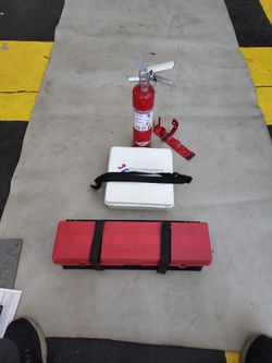 American Safety. First Aid Kit Fire Extinguisher. 2 1/2 . L B. And Triangle..