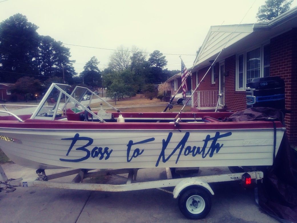 boat and new 115hp powertrim outboard