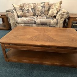 Brown wood coffee table with 2 side tables