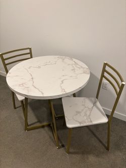 Table and two chairs.