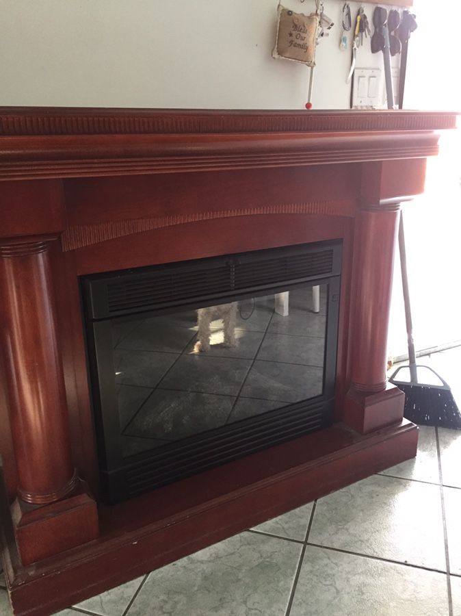 Beautiful walnut/cherry wood electric fireplace twin star cheap!!