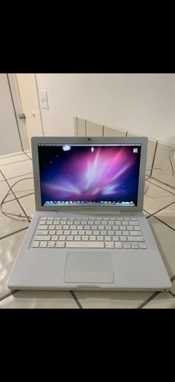 MAC OS X White Laptop