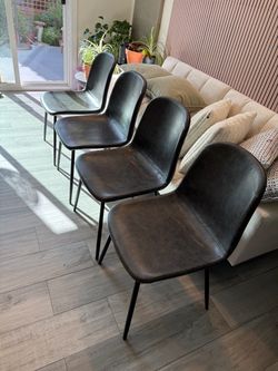 Set of 4 leather dinning chairs