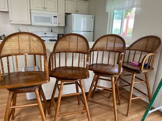 Four solid oak barstools
