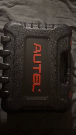 doing car diagnostics, An making Spare Keys 