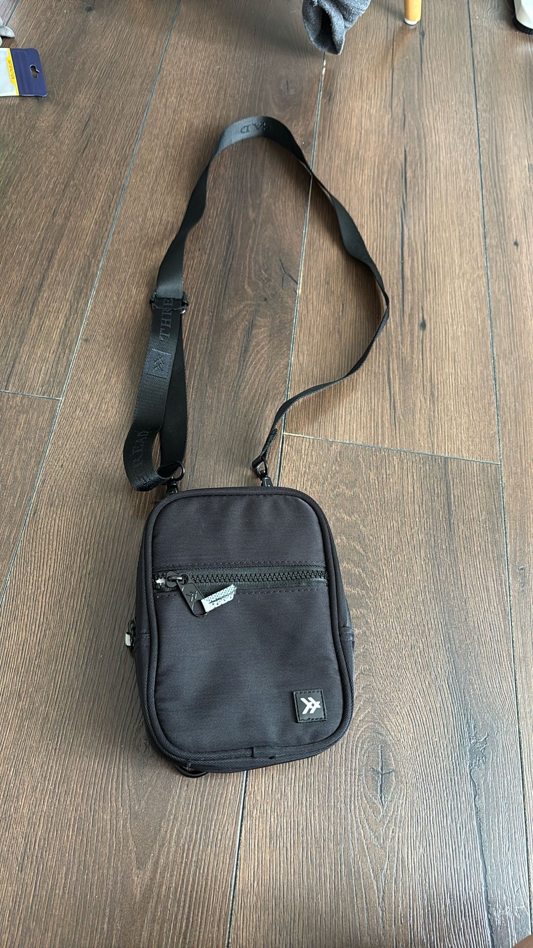 Threads crossbody bag