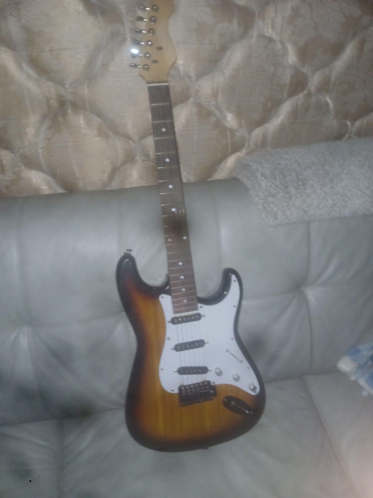 Electric guitar with black hardware