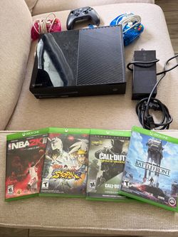 Xbox One with games and controller