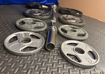 NEW Olympic Equipment Curl Bar of 20# with Cooper Bearings and Plates 2X35s, 2X25s, 2X10s and 2X5s pounds. Brute 170#