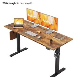 Electric standing desk and ergonomic chair