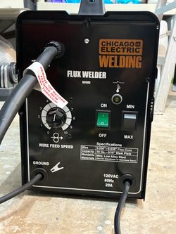 Portable welder with helmet gloves