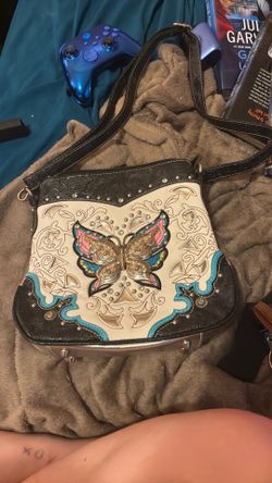 A cowgirl trendy crossbody purse