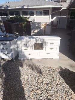 Freshly sanded and painted solid wood six drawer dresser with storage area in the center behind the door it could be a dresser Buffet sideboard TV sta