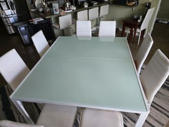 Glass table 8 personas.