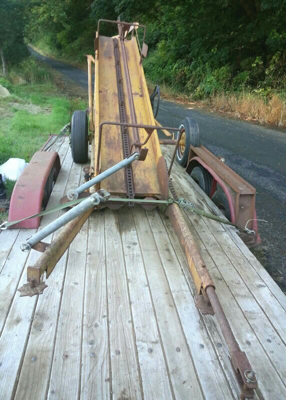 Newhouse hay bale lift loader