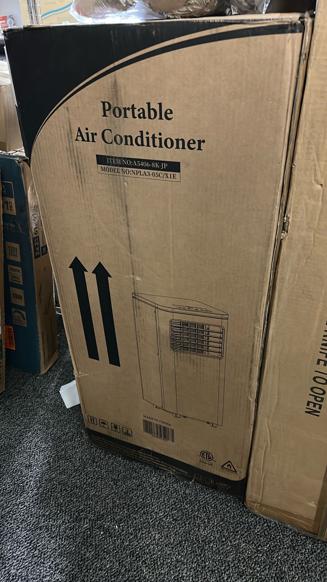 10,000 BTU Portable Air Conditioner Cools 450 sq. ft. with Heater, Dehumidifier and Remote in White